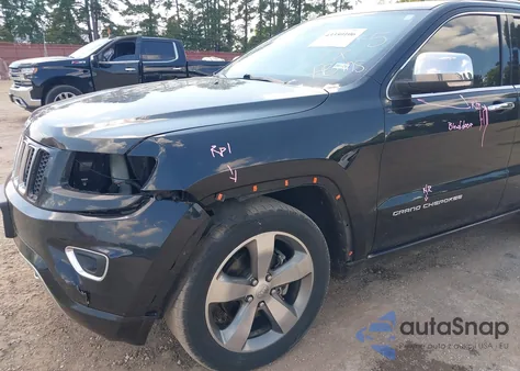 2014 Jeep Grand Cherokee Overland из США, поврежденный, VIN 1C4RJECG4EC410218